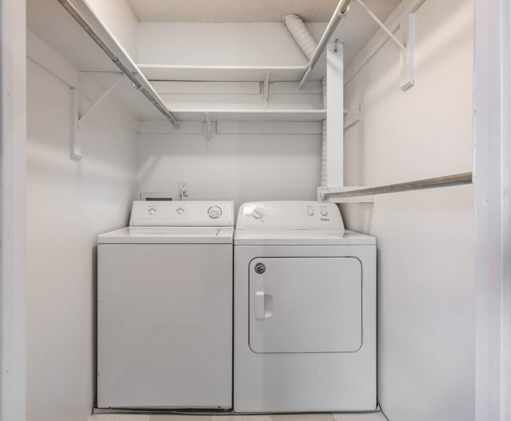 Washer and dryer in a walk in closet