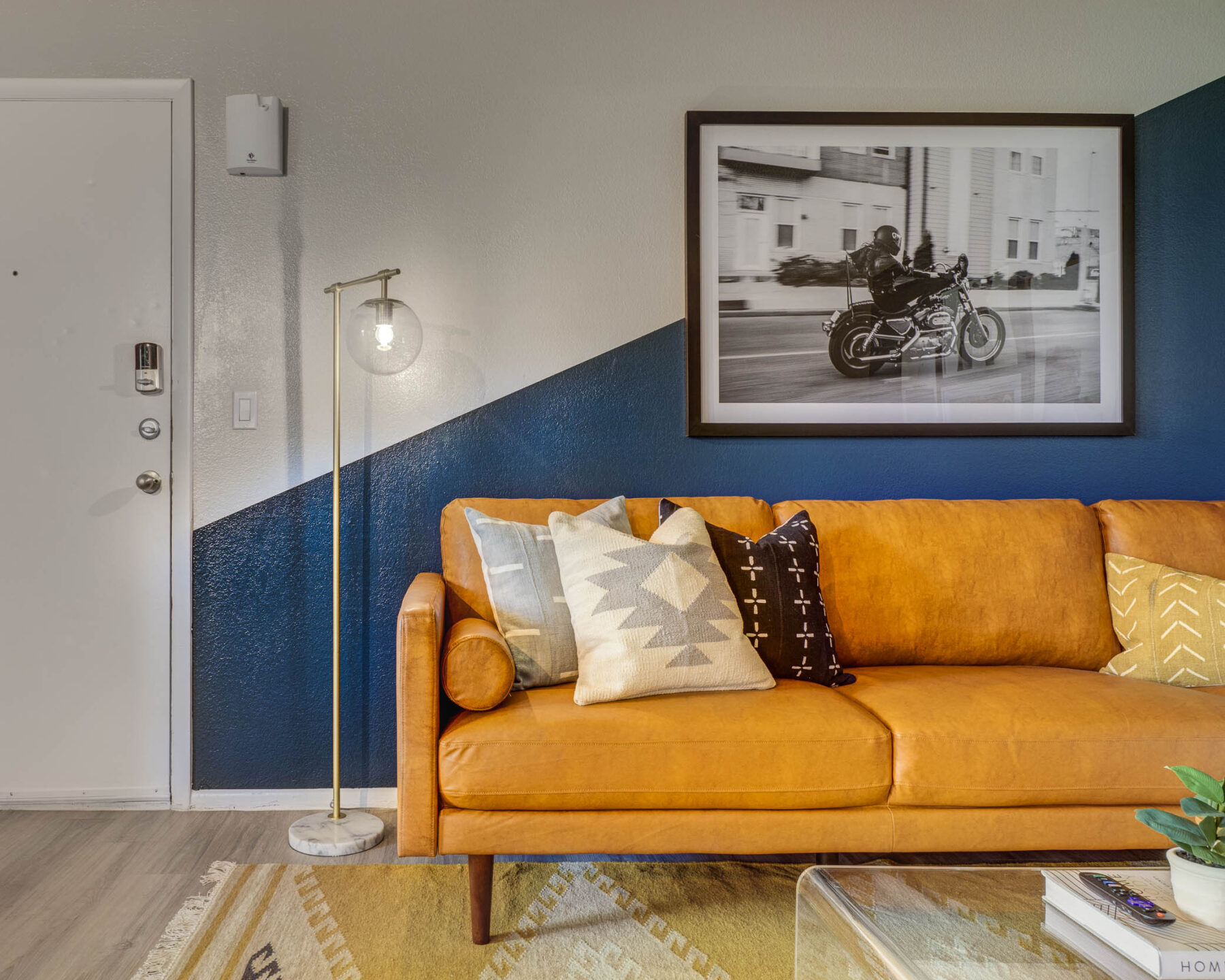 Staged living room with two tone accent wall